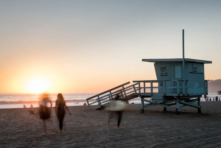 Lifeguard tower on the beach at sunset